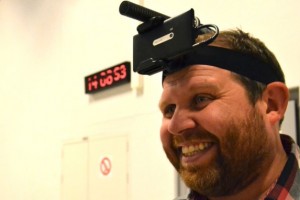 Guy with Nokia N9 strapped to head, live streaming his view of the world