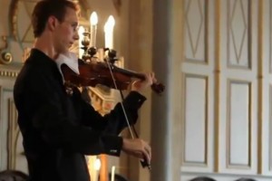 Violinist interrupted by Nokia ringtone, plays the Nokia tune.