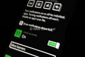 Leak or fake? Blurry cam shot of WP8.1 quick settings and notification options?